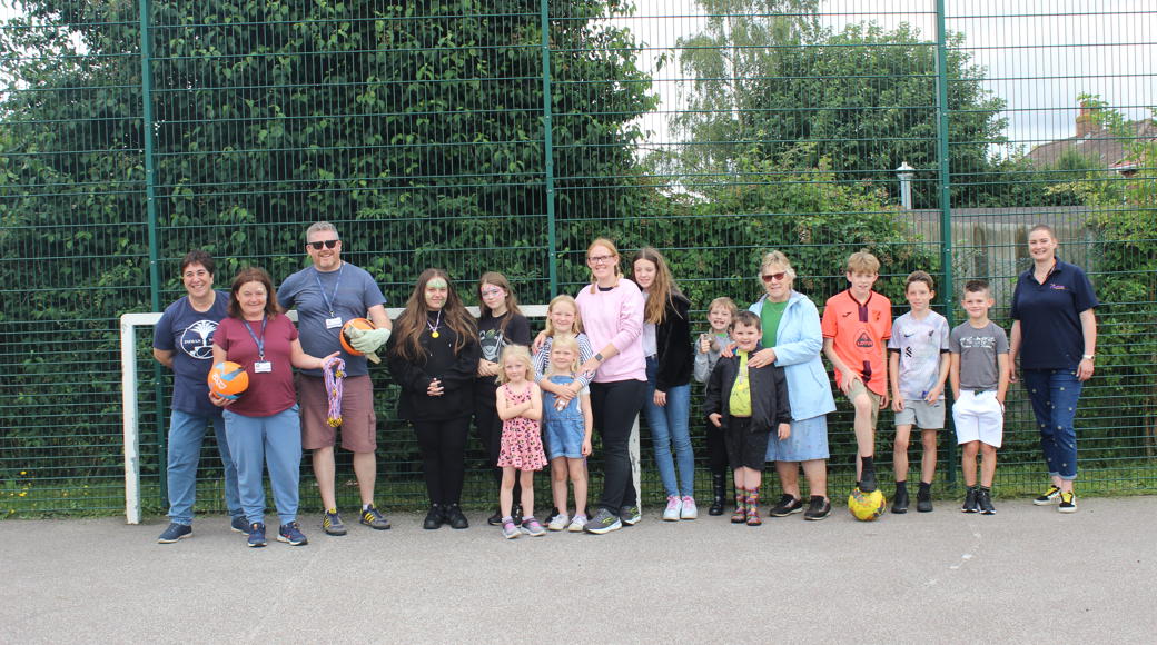 Wymondham Silfield Avenue Community Fun Day Attendees Lined Up By Goal Post