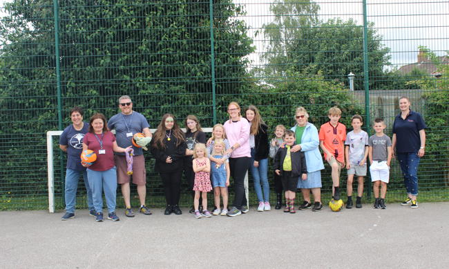 Wymondham Silfield Avenue Community Fun Day Attendees Lined Up By Goal Post