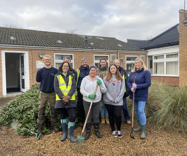 Members Of Saffron Volunteer To Plant Bulbs At Weaver's Court In Diss